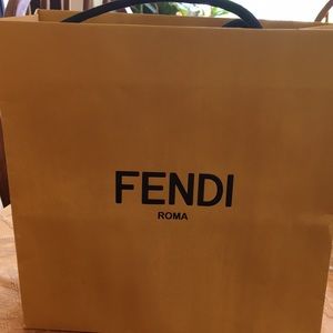 Fendi mink fur power bank with cord.